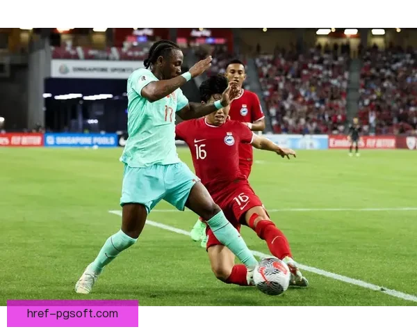 中国男足世预赛生死战惊险取胜新加坡展现不屈斗志